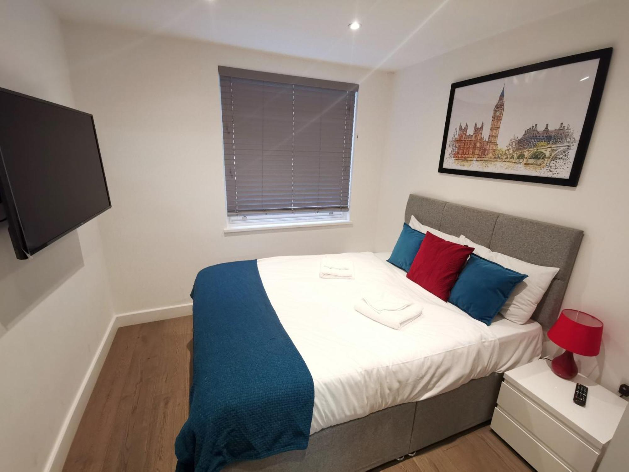 City Prime Apartments Londýn Exteriér fotografie A bedroom in a serviced apartment in London