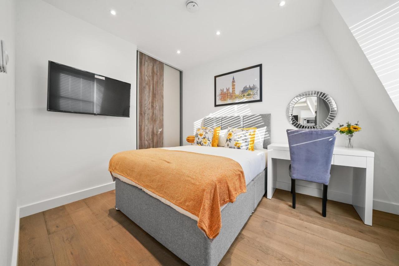City Prime Apartments Londýn Exteriér fotografie A bedroom in a serviced apartment in London
